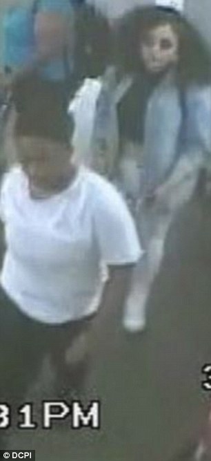 Teenage girls who 'senselessly beat elderly woman, 78, on New York City subway after she asked them to move feet off seat turned in to police by one of their mothers'