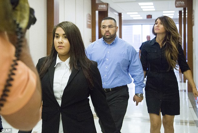 Teacher, 24, who admits she had continuous sex with pupil, 13, and got pregnant with his child wears baggy pantsuit to court where she's told to stay away from minors